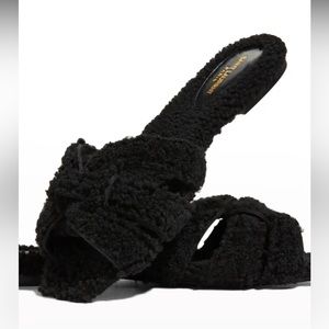YSL tribute shearling sandals.